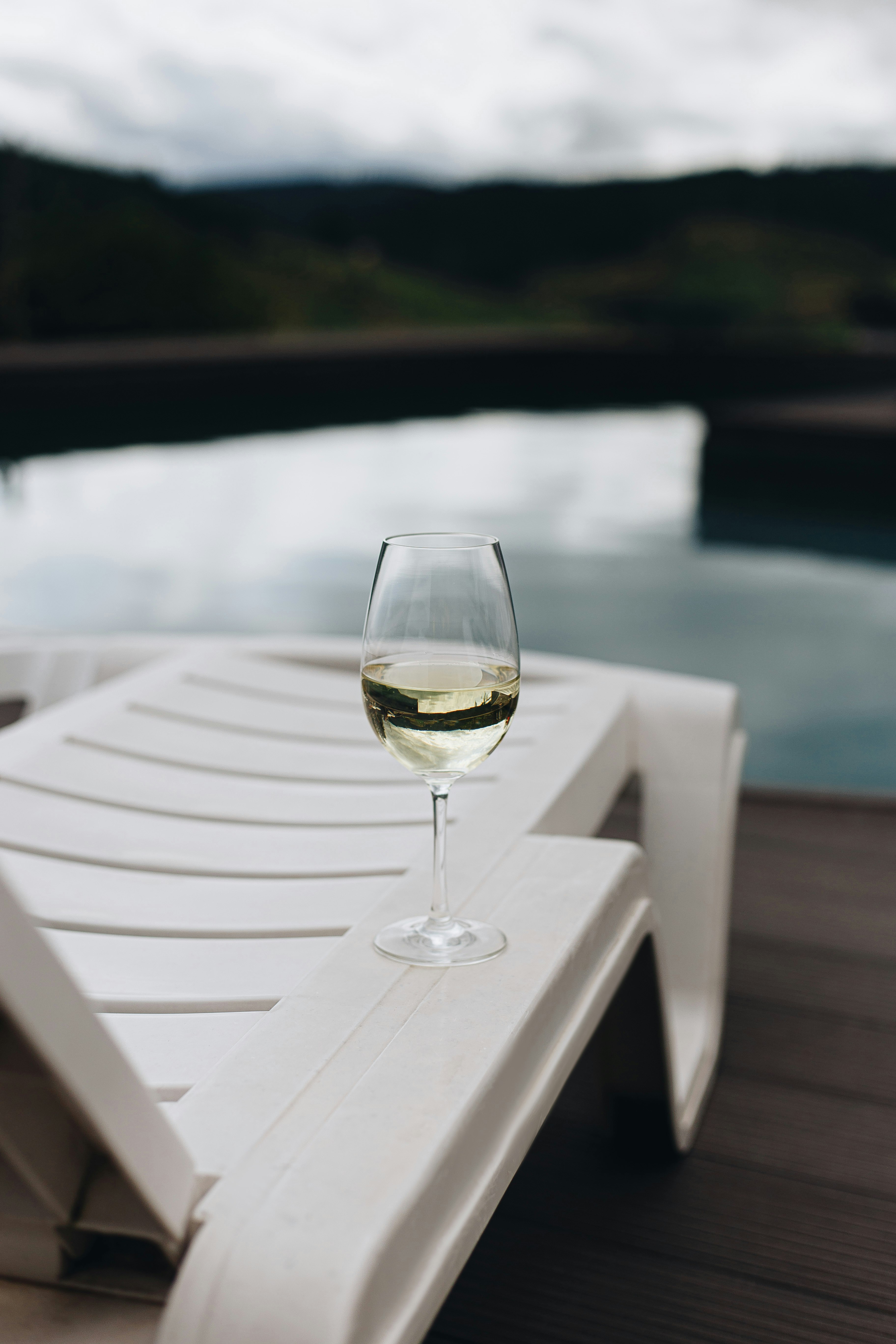 clear wine glass on white table